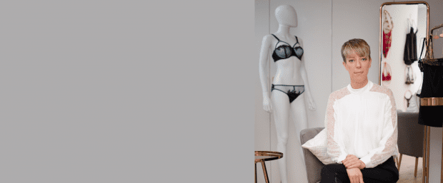 Sarah Connelly lingerie expert in lingerie shop with mannequin in Edinburgh Glasgow